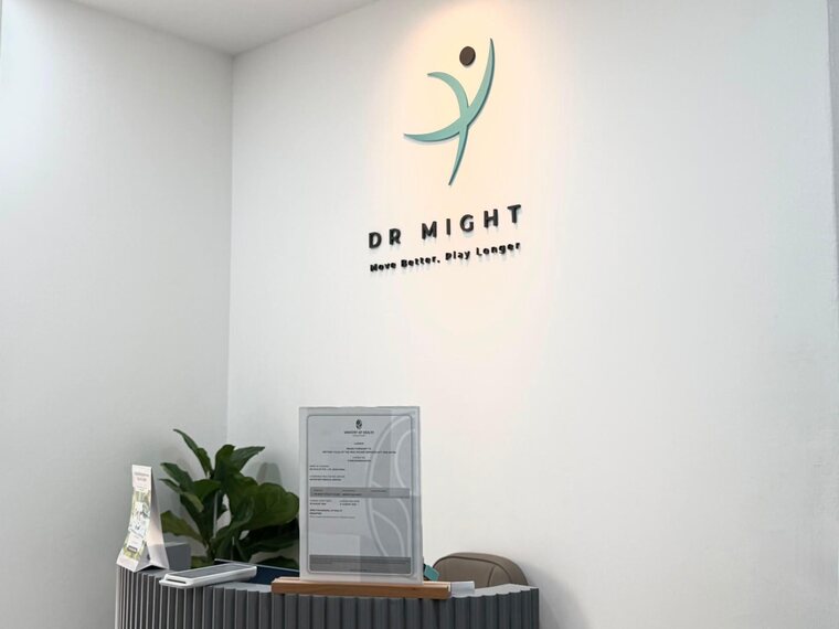 The DR MIGHT wall sign above the framed Ministry of Health licence